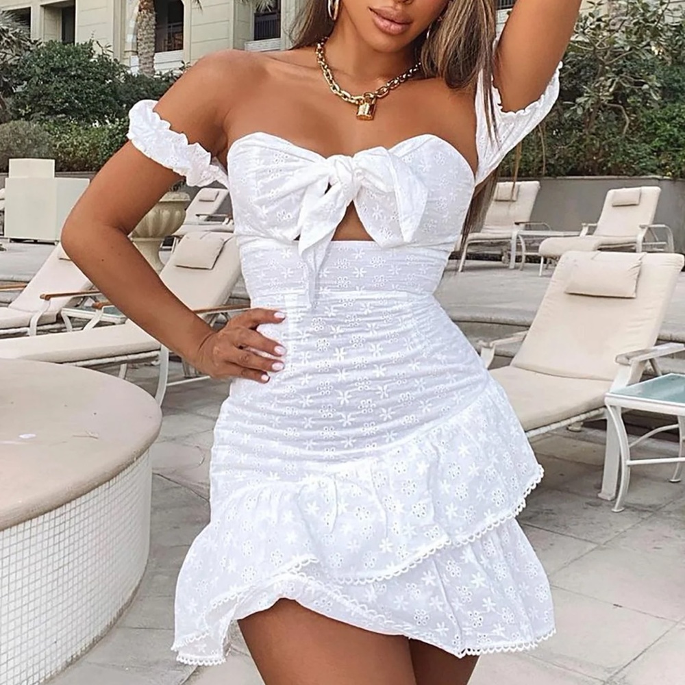 The cutest summer dress! Perfectly fitting white dress with cute puff sleeve